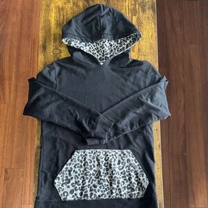 On the Byas Black Hoodie with Leopard Print Accents